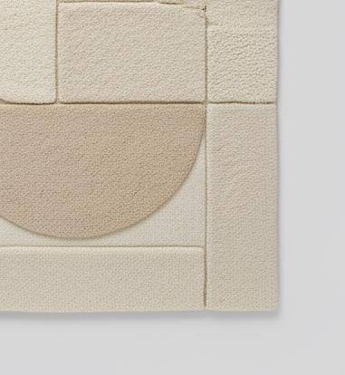 Translation missing: es.3D textured geometric area rug in beige and cream with carved design for modern home decor