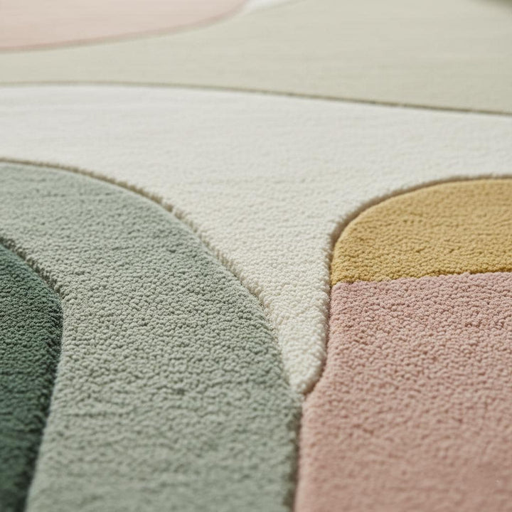 Translation missing: en.Mid-century color block area rug with soft neutral geometric design in sage, blush, mustard, cream, and grey tones