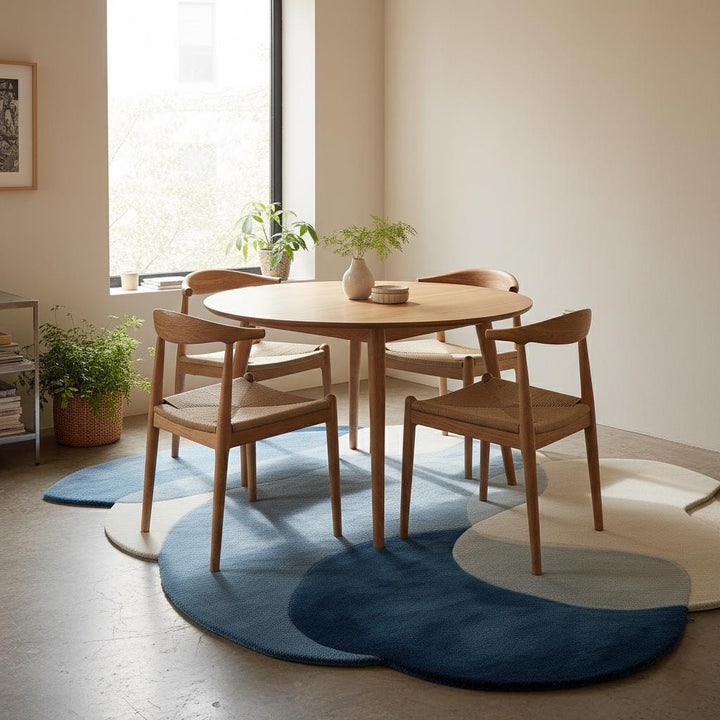 Translation missing: es.Abstract pebble rug with freeform blue and beige overlapping pebble shapes and plush cut pile surface