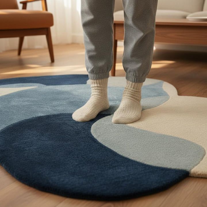 Translation missing: es.Abstract pebble rug with freeform blue and beige shapes and plush cut pile surface