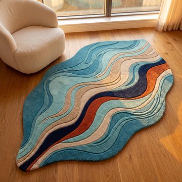 Translation missing: es.Handmade abstract wool rug with flowing wave pattern in teal blue, cream, navy, and rust tones styled in a modern living room __etsy:8006170624