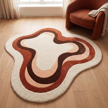 Translation missing: es.Handmade abstract wool blend rug with organic curved pattern in terracotta and ivory tones styled in a modern living room __etsy:7994283548