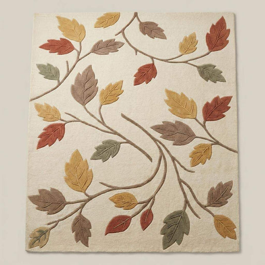 Translation missing: es.Top-down view of modern autumn leaf area rug displaying full branch pattern, neutral ivory base, and multicolor fall leaves arranged in flowing botanical design