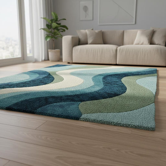 Translation missing: es.Blue wavy abstract area rug with layered blues and teals in a modern coastal living room setting