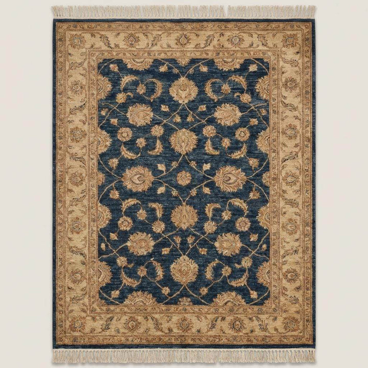Translation missing: es.Traditional blue wool area rug with floral vine pattern and beige border detail