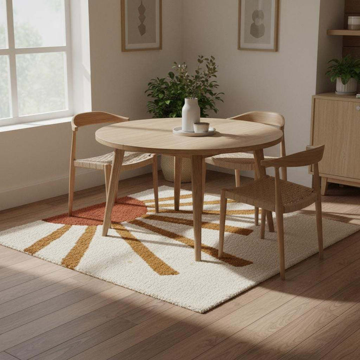 Translation missing: es.Neutral cream rug with bold sunrise pattern, perfect for cozy interiors