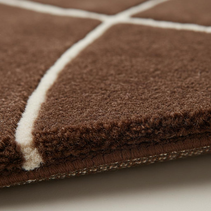 Translation missing: en.Brown abstract rug with modern curved white lines on rich brown background, hand tufted carpet for contemporary living spaces
