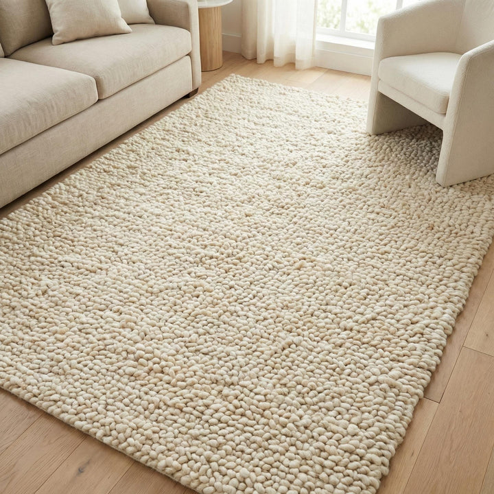 Translation missing: es.Chunky handwoven wool rug in neutral cream for Scandinavian minimalist decor