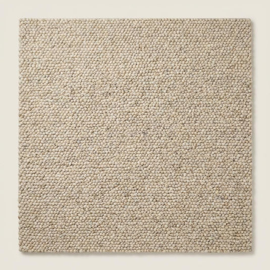 Translation missing: es.Top view of neutral chunky rug with dense loop weave texture, highlighting organic pattern and soft beige tones across the full surface