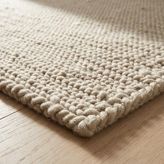 Translation missing: es.Chunky knit beige braided rug with thick textured wool-look and plush softness for cozy living room decor