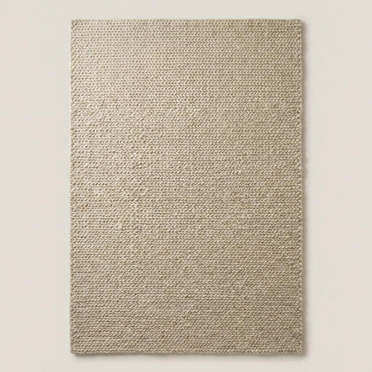 Translation missing: es.Chunky knit beige braided rug with thick textured wool-look and plush softness for cozy living room decor