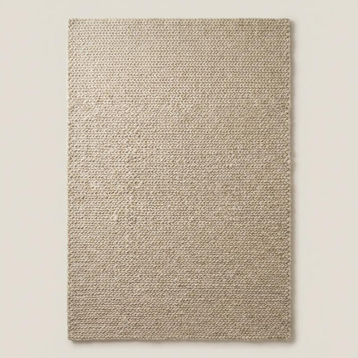 Translation missing: es.Chunky knit beige braided rug with thick textured wool-look and plush softness for cozy living room decor