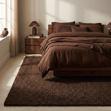 Translation missing: fr.Chunky knit rug in dark brown with thick braided roving texture for cozy modern organic interiors