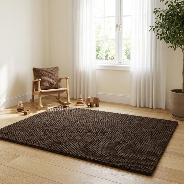 Translation missing: fr.Dark brown chunky knit rug with thick braided roving texture for cozy modern organic interiors