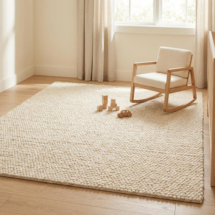 Translation missing: es.Chunky knit wool rug with thick looped cream texture, cozy and soft floor accent for neutral modern interiors