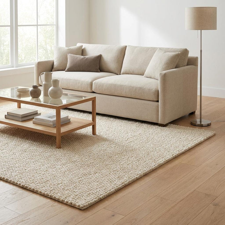 Translation missing: es.Chunky knit wool rug with thick cream loops and plush texture for cozy, neutral floor decor