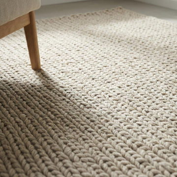 Translation missing: fr.Chunky knit wool rug in neutral cream with thick, soft texture for cozy living room décor