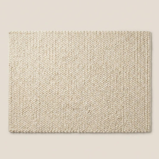 Translation missing: es.Chunky knit wool rug with thick neutral texture for cozy living room or nursery flooring