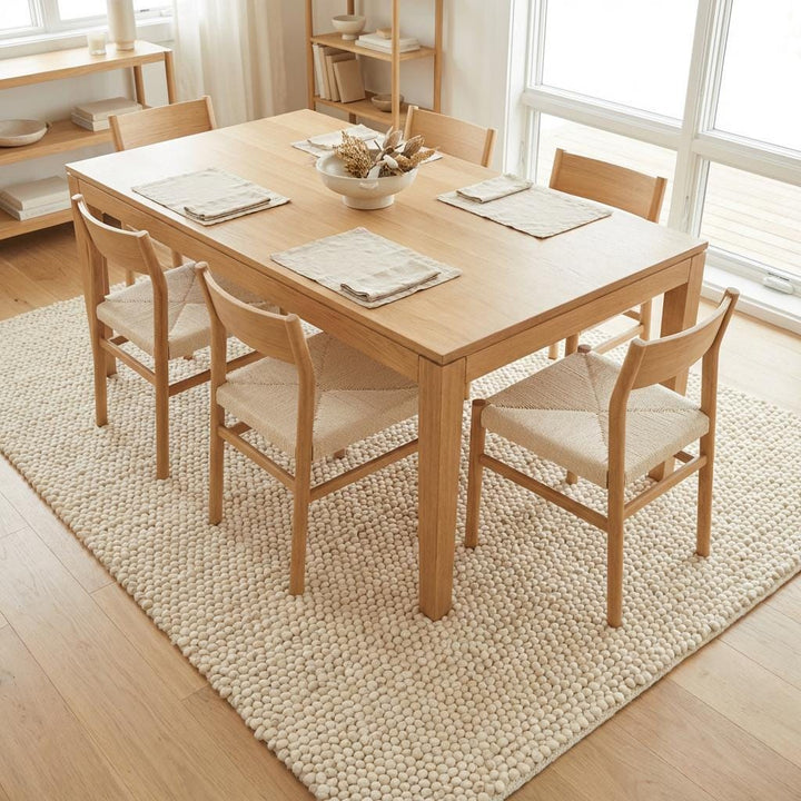 Translation missing: es.Chunky knit wool rug with thick, neutral cream loops for cozy living room or nursery floors