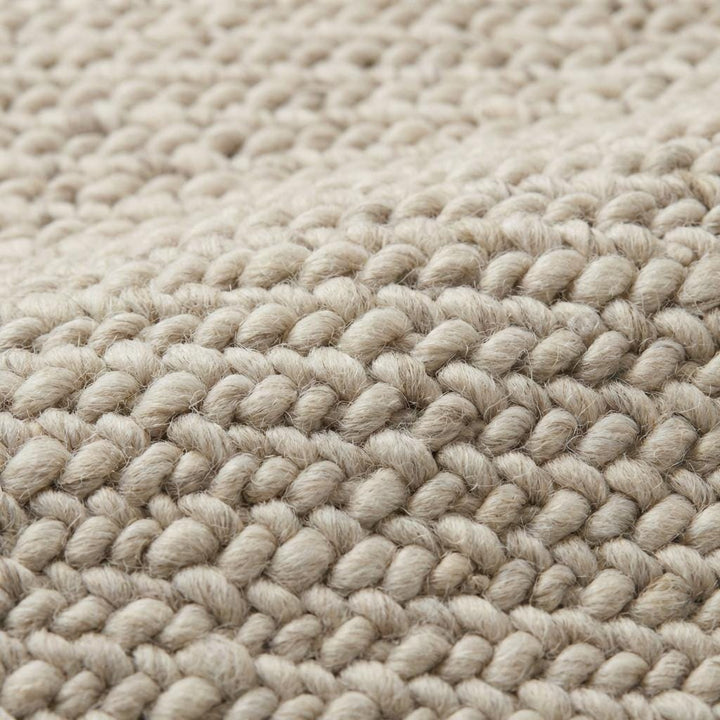 Translation missing: es.Detailed close-up of thick chunky wool fibers showing plush looped texture