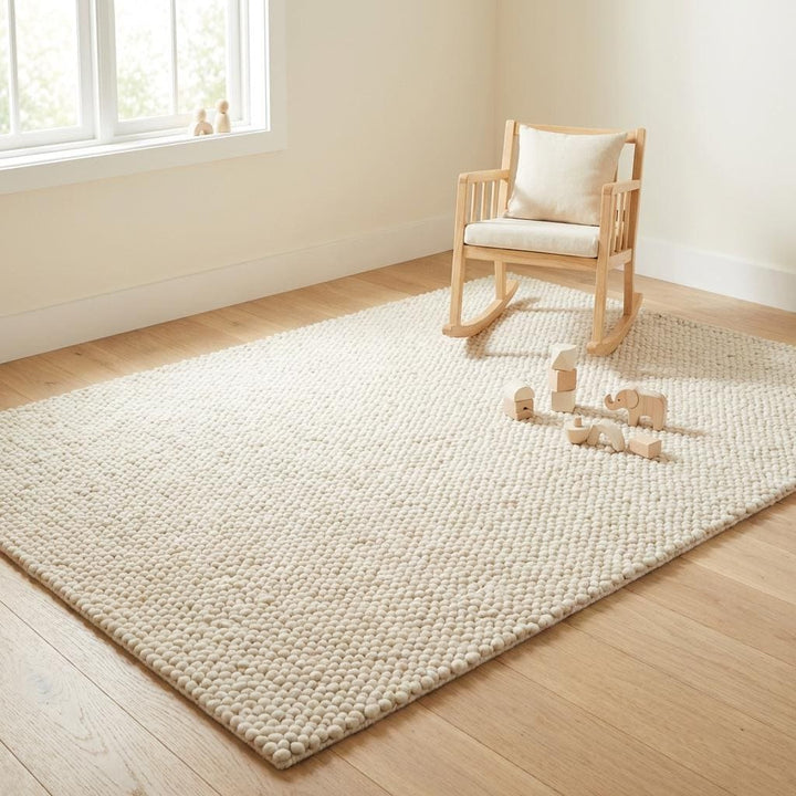 Translation missing: es.Soft chunky knit wool rug in nursery room setting, providing cozy, warm, and safe textured flooring ideal for kids and minimalist family homes