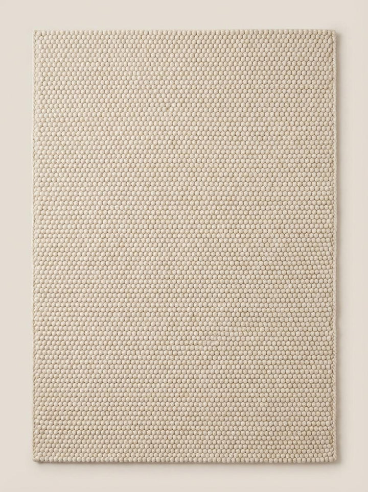 Translation missing: en.Top surface texture of plush loop rug with dimensional woven rows