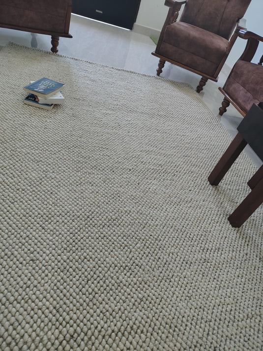 Translation missing: es.Modern minimalist rug in soft ivory with heavy dimensional texture
