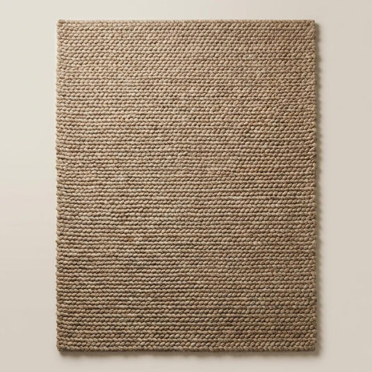 Translation missing: es.Chunky wool area rug in thick beige handwoven texture for cozy living room flooring