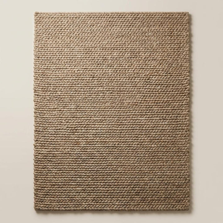 Translation missing: es.Chunky wool area rug in thick beige handwoven texture for cozy living room flooring