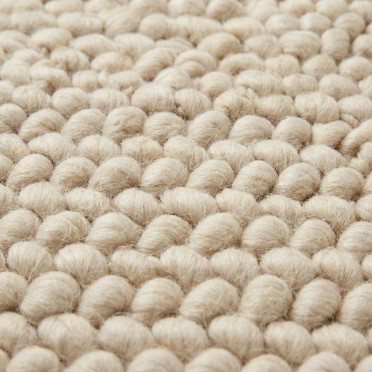 Translation missing: es.Chunky wool loop rug in cream with thick textured yarn loops, handcrafted cozy area rug for modern organic interiors