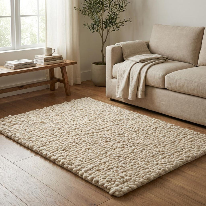 Translation missing: es.Handcrafted chunky wool loop rug in cream with thick textured loops for cozy neutral hygge decor