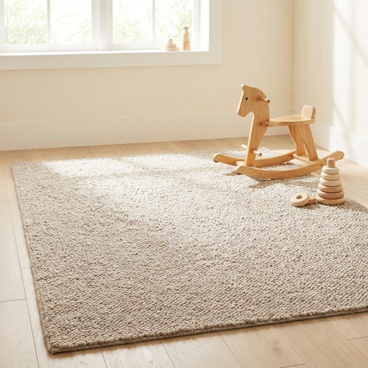 Translation missing: es.Soft chunky loop rug styled in nursery room, cozy neutral beige rug perfect for kids space, safe textured surface for warm and comfortable flooring