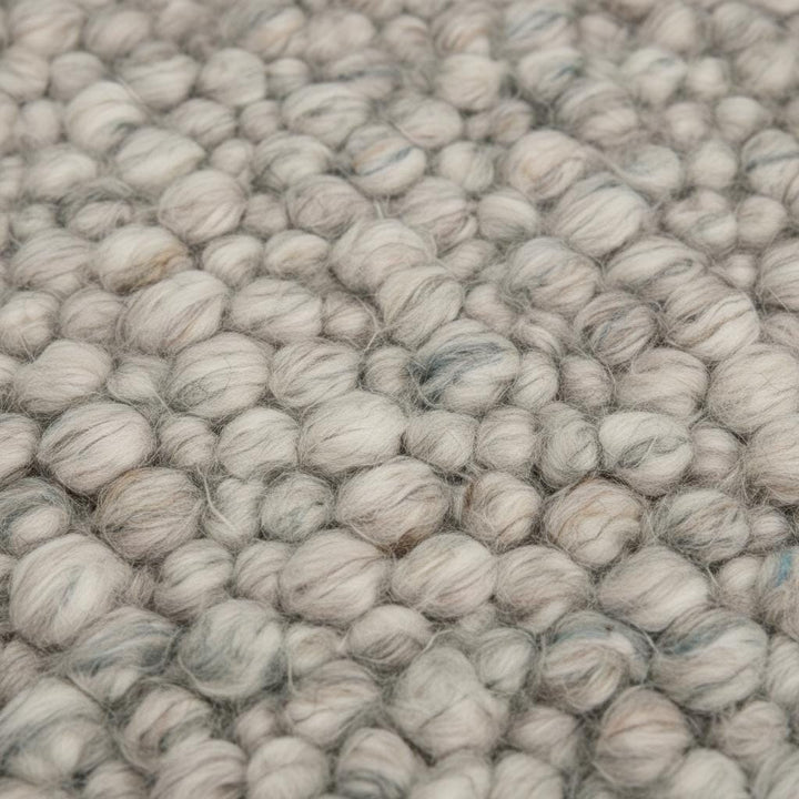 Translation missing: es.Handmade natural wool rug with thick pebble texture, beige and ivory fibers, ideal for modern minimalist living room décor