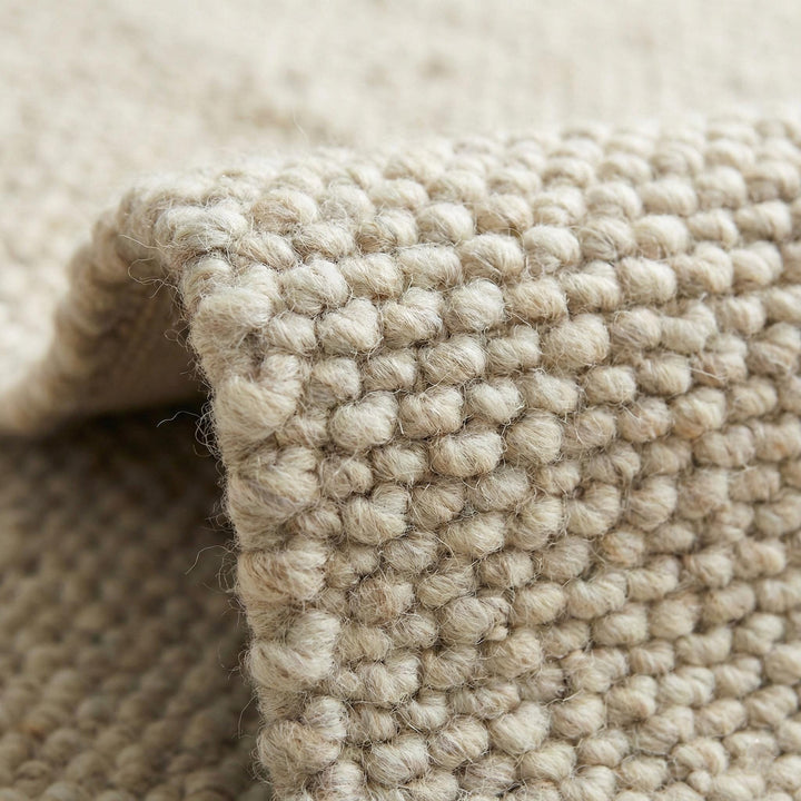 Translation missing: es.Chunky wool neutral area rug with textured ivory woven loops for cozy modern interiors