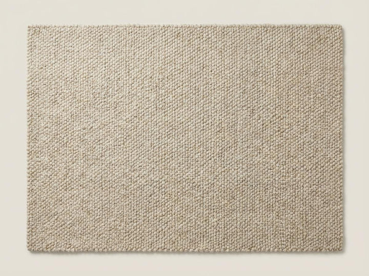 Translation missing: es.Macro shot of woven rug fibers showing soft, matte texture