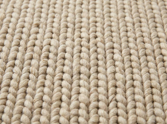 Translation missing: es.Close-up of thick looped knit texture showing plush, oversized yarn