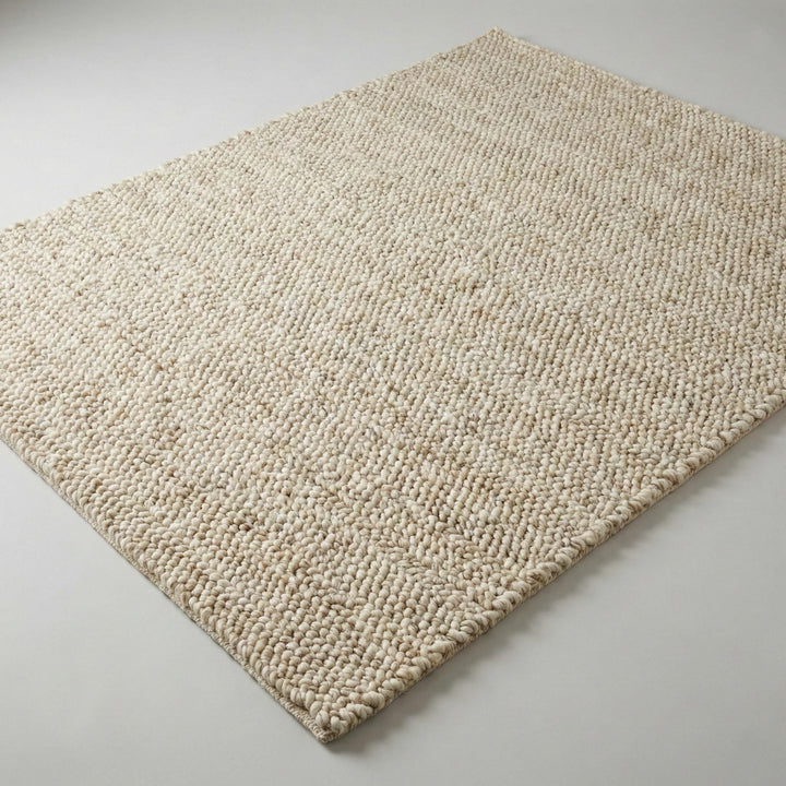 Translation missing: es.Chunky wool neutral area rug with thick textured cream loops for cozy modern interiors