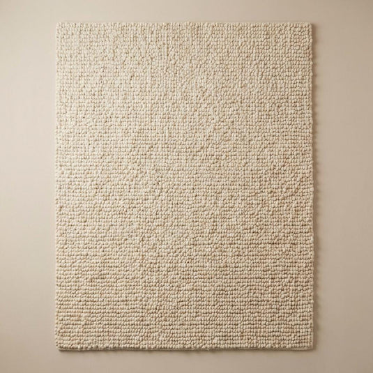 Translation missing: es.Chunky wool pebble rug with thick ivory textured loops for cozy modern living room