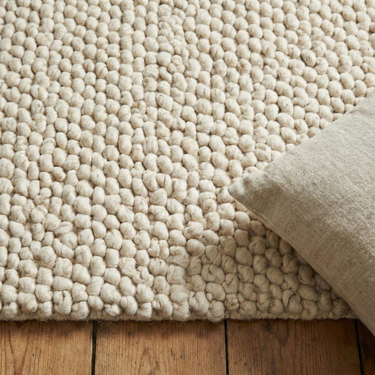 Translation missing: es.Chunky wool rug with thick looped cream texture for cozy modern farmhouse and Scandinavian decor