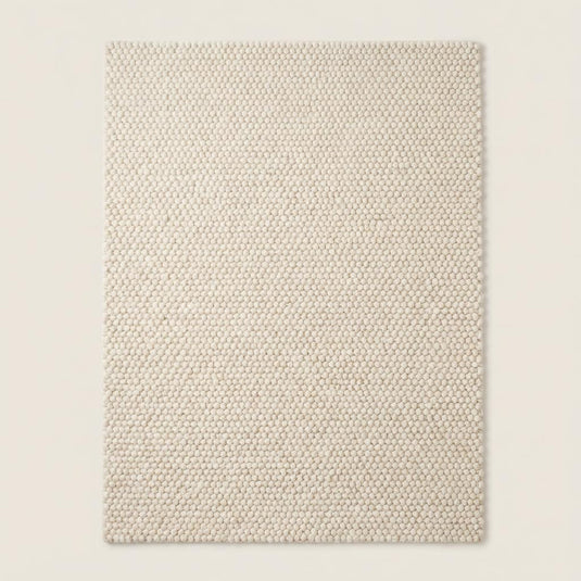 Translation missing: es.Thick woven wool area rug in soft neutral color perfect for Scandinavian style home interior