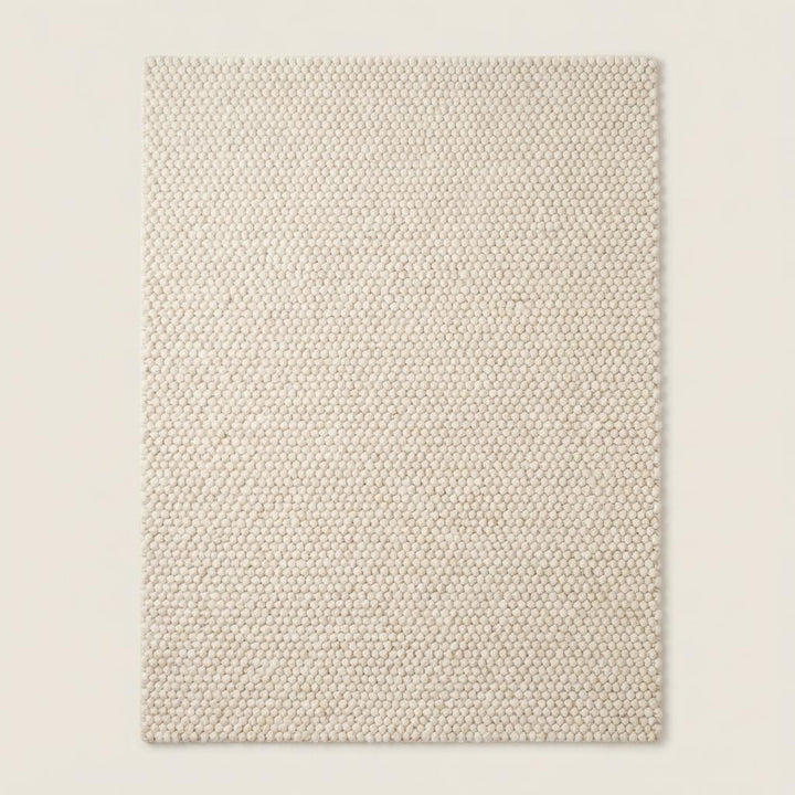 Translation missing: es.Thick woven wool area rug in soft neutral color perfect for Scandinavian style home interior