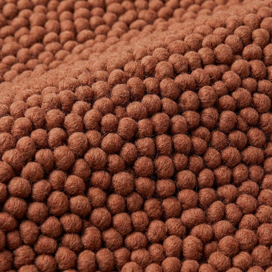 Translation missing: es.Detailed view of thick looped yarn surface with soft matte finish