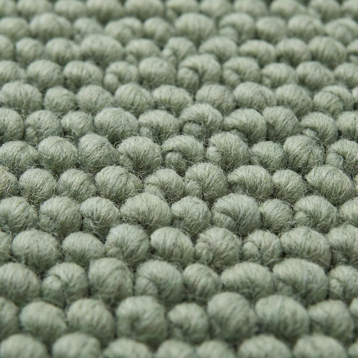 Translation missing: fr.Chunky wool textured area rug in sage green with thick looped texture and cozy cushioned feel