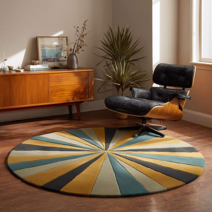 Translation missing: es.Hand tufted round geometric rug with starburst pattern in mustard, teal, and charcoal tones, made from plush New Zealand wool