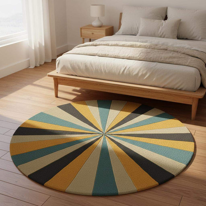 Translation missing: es.Round geometric rug with hand tufted starburst pattern in mustard, teal, charcoal, and beige wool