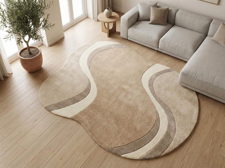 Translation missing: es.Modern curved rug living room with wavy abstract pattern in beige, cream, and taupe organic shape