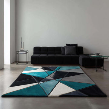 Translation missing: fr.Deep teal area rug with hand tufted plush geometric pattern in deep teal, blue, and ochre, durable poly-blend material, modern abstract carpet design