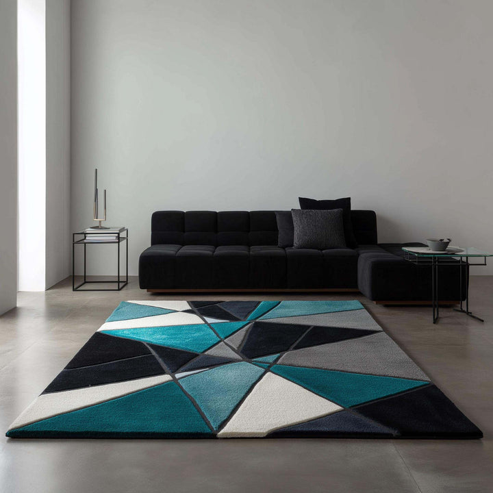 Translation missing: en.Deep teal area rug with hand tufted plush geometric pattern in deep teal, blue, and ochre, durable poly-blend material, modern abstract carpet design