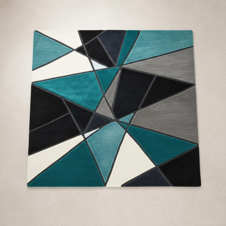Translation missing: en.Deep teal area rug with abstract geometric design and hand tufted plush texture