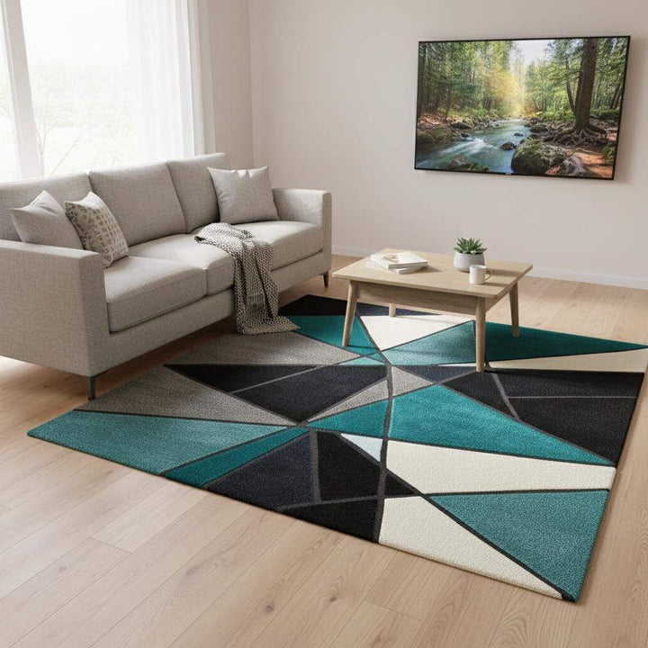 Translation missing: en.Hand tufted deep teal area rug with modern abstract geometric design and plush poly-blend fibers